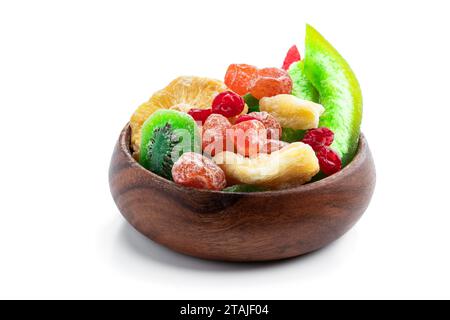Candied  fruits in wooden bowl isolated on white Stock Photo
