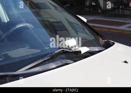 Oops, thos car received a parking ticket. Stock Photo