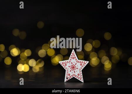 A star shaped Christmas ornament with fairy lights Stock Photo