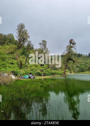 Jalan Ranu Regulo Landscape view of Ranu Regulo Lake, Lumajang, East Java, Indonesia ...