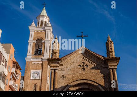 It was built in 1886 in neo-Romanesque style. It has a main façade characterized by brick cladding. The interior has three naves, in neo-Romanesque st Stock Photo
