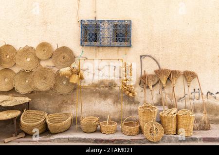 Bir Al Huffay, Sidi Bouzid, Tunisia. Woven baskets and brooms for sale at the outdoor souk in Bir al Haffay. Stock Photo