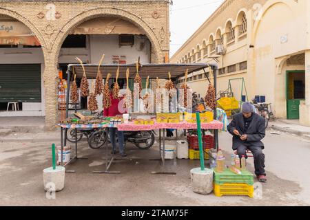 Bir Al Huffay, Sidi Bouzid, Tunisia. March 19, 2023. Man selling dates at the outdoor souk in Bir al Haffay. Stock Photo