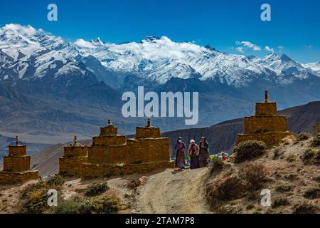 Pilgrims arrive at Lo Gekar Monastery in Ghar village,  the oldest Buddhist gompa in Nepal, built by Guru Rimpoche in the 8th century - Mustang Distri Stock Photo