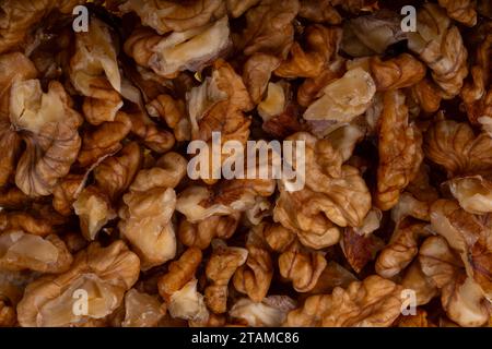 Walnuts on a black brown background. Stock Photo