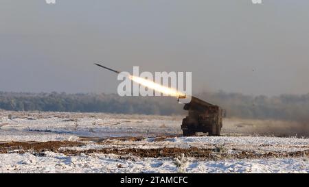 The sound of artillery! A HIMARS belonging to the 3rd Battalion, Field Artillery Regiment, XVIII Airborne Corps, demonstrates its lethal capabilities during the with US-Polish MARS 23 LFX in Toruñ, Poland on December 1, 2023. The exercise included an array of weapon systems across both the U.S. and Polish field artillery arsenal. Soldiers from the 2nd Armored Brigade Combat Team are stationed throughout Europe to support Operation European Assure Deter and Reinforce. (Photo by U.S. Army Spc. Trevares Johnson) Stock Photo