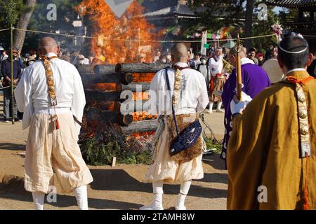 Kagawa, Japan - November 23th 2023: Sacred bonfires during Japanese, called Gomataki. Religious bonfire in the Zentuji-Park, Kagawa. Stock Photo