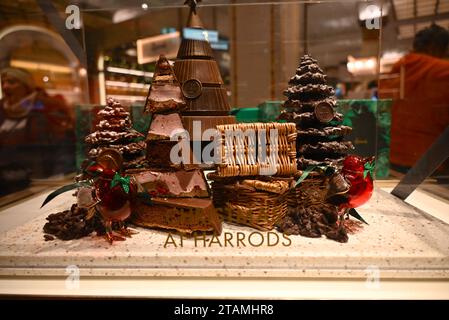 London starting to look like Christmas with visitors shopping goddies stoking up for seasonal celebrations and enjoying the tress and ornaments on display all around the city centre ... Stock Photo