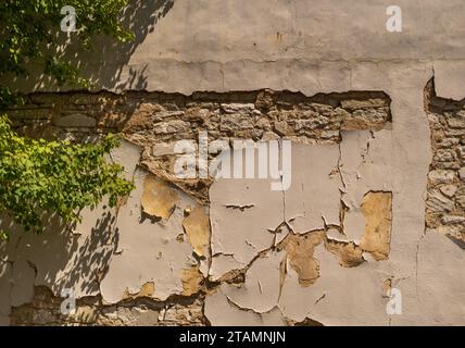 Cracked Paint Mud Brick Wall Sunny Direct Sunlight Outside Trees Shadows Texture Peeling Stock Photo