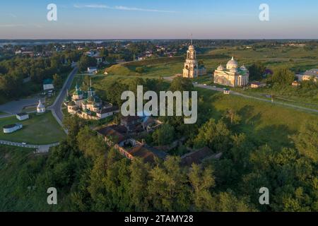 Ancient temples in the city landscape on a early July morning (aerial photography). Staritsa. Tver region, Russia Stock Photo