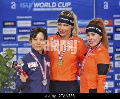 Jutta Leerdam (C) of the Netherlands poses for a photo after 
