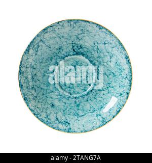 Empty blue porcelain saucer cutout. Beautiful dessert plate textured of turquoise marble isolated on a white background. Modern porcelain tableware. Stock Photo