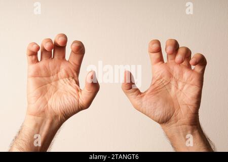 man hands in gesture of grabbing or hanging, isolated Stock Photo