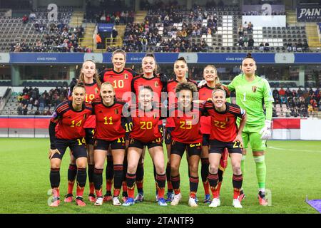 back row: Belgium's Sari Kees (19), Belgium's Justine Vanhaevermaet (10), Belgium's Tine De Caigny (6), Belgium's Amber Tysiak (4), Belgium's Tessa Wullaert (captain)(9), Belgium's goalkeeper Nicky Evrard (1) front row: Belgium's Jassina Blom (14), Belgium's Janice Cayman (11), Belgium's Marie Detruyer (20), Belgium's Kassandra Missipo (23) and Belgium's Laura Deloose (22) posing for the team photo before a match between Belgium's national women's team, called the Red Flames and Scotland's national women's team, game 5/6 in the 2023-24 UEFA Women's Nations League competition, on Friday 01 D Stock Photo