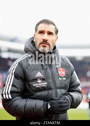 Nuremberg, Germany. 02nd Dec, 2023. Soccer: Bundesliga 2, 1. FC Nuremberg - Fortuna Düsseldorf, Matchday 15, Max-Morlock-Stadion. Coach Cristian Fiel (1.FC Nuremberg). Credit: Heiko Becker/dpa - IMPORTANT NOTE: In accordance with the regulations of the DFL German Football League and the DFB German Football Association, it is prohibited to utilize or have utilized photographs taken in the stadium and/or of the match in the form of sequential images and/or video-like photo series./dpa/Alamy Live News Stock Photo