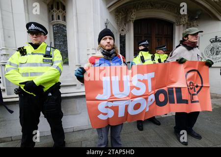 London, UK. 2nd Dec 2023. Just Stop Oil protesters march from New Scotland Yard to the Supreme Court. Credit: Matthew Chattle/Alamy Live News Stock Photo