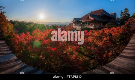 Panorama of Kiyomizu dera temple with red maple leaf and lens flare,  Kyoto, Japan, Autumn season Stock Photo
