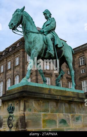 Christian IX equestrian statue, overlooking Christiansborg Ridebane on Slotsholmen in Copenhagen, Denmark Stock Photo