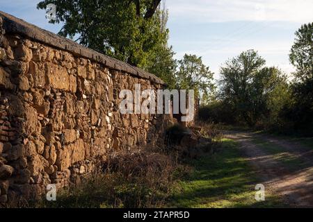 Europe, Spain, Castile and León; Sanjuanejo, Ancient Stone Wall around the Monasterio de Santa María de la Caridad Stock Photo