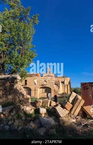 Europe, Spain, Castile and León; Sanjuanejo, Collapsing Stone Wall looking in to the Monasterio de Santa María de la Caridad Stock Photo