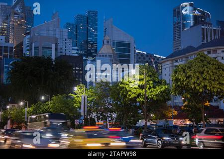 Singapore City, Singapore - September 08, 2019: Low wide-angle view looking up to modern skyscrapers in business district of Singapore City. Stock Photo
