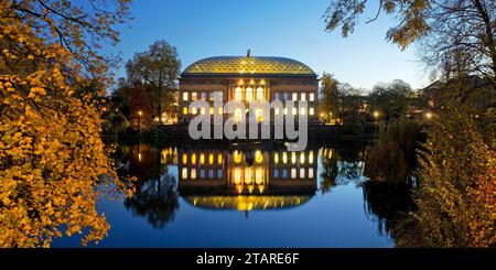 The Staendehaus K21 is reflected in the Kaiserteich in autumn in the evening, Schwanenspiegel, Duesseldorf, North Rhine-Westphalia, Germany Stock Photo