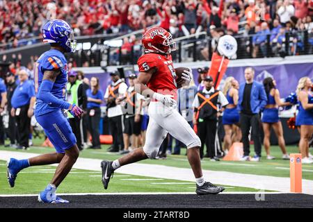 December 02, 2023: UNLV Rebels running back Vincent Davis Jr. (5) scores a touchdown during the Mountain West Football Championship game featuring the Boise State Broncos and the UNLV Rebels at Allegiant Stadium in Las Vegas, NV. Christopher Trim/CSM. Stock Photo