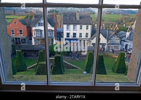 View of the book town town shops and street outside from inside Hay Castle looking through window Hay-on-Wye Wales UK Great Britain   KATHY DEWITT Stock Photo