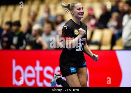 Herning, Denmark. 02nd Dec, 2023. Handball, Women: World Championship, Iran - Germany, preliminary round, Group F, match day 2. Germany's Jenny Behrend celebrates after scoring a goal. Credit: dpa/Alamy Live News Stock Photo