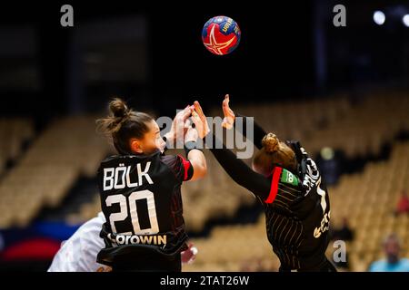 Herning, Denmark. 02nd Dec, 2023. Handball, Women: World Championship, Iran - Germany, preliminary round, Group F, match day 2. Germany's Emily Bölk (l) and Meike Schmelzer block the ball. Credit: Dpa/dpa/Alamy Live News Stock Photo