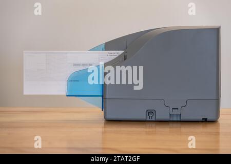 Bank Cheque scanner used to deposit cheques remotely Stock Photo - Alamy