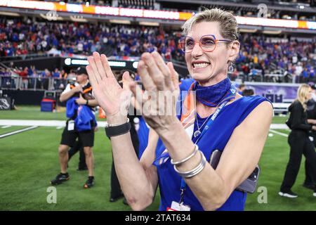 Boise State President Marlene Tromp applauds while watching on the ...