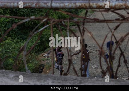 Haitian boys play play on the Massacre River between the Dominican ...