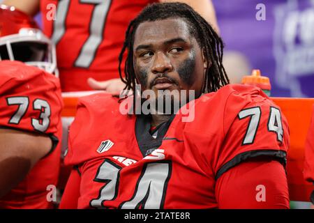 December 02, 2023: UNLV Rebels offensive lineman Jalen St. John (74) sits on the bench during the second half of the Mountain West Football Championship game featuring the Boise State Broncos and the UNLV Rebels at Allegiant Stadium in Las Vegas, NV. Christopher Trim/CSM. Stock Photo