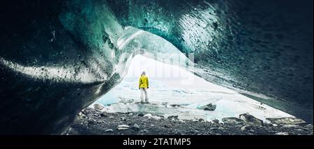 Panoramic viewpoint tourist by Fjallsjökull glacier in Iceland from inside glacier cave. Explore sightseeing Iceland spectacular hidden gems. Traveler Stock Photo