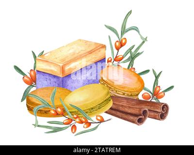 Yellow sweets surrounded by sea buckthorn branches and cinnamon sticks. Cake, macarons, berries. Traditional French macarons, cake. Fruit dessert Stock Photo