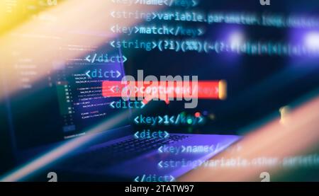IT specialist workplace. Computer code data. Project managers Stock Photo