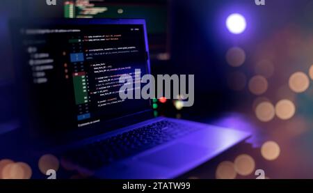 IT specialist workplace. Computer code data. Project managers Stock Photo