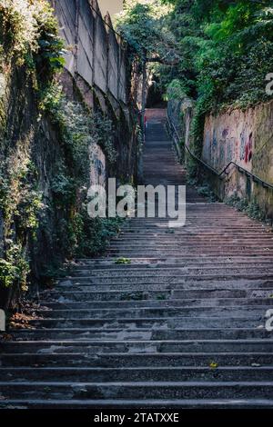 The narrow and steep stairs of the Nicolas de Lance ascent leading to the top of Fourvière Hill in Old Lyon. Stock Photo