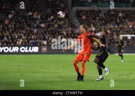 Los Angeles, California, USA. 2nd Dec, 2023. Houston Dynamo FC midfielder GRIFFIN DORSEY (25) and Los Angeles FC defender DIEGO PALACIOS (12) jostle for possession during the 2023 MLS Western Conference final match between Los Angeles FC and Houston Dynamo FC at BMO Stadium in Los Angeles, California. (Credit Image: © Brenton Tse/ZUMA Press Wire) EDITORIAL USAGE ONLY! Not for Commercial USAGE! Stock Photo