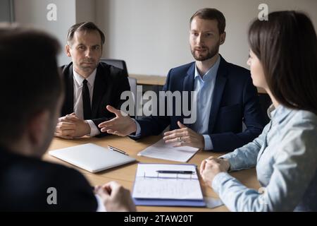 Businessman make speech at meeting with clients Stock Photo