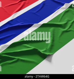 Flag of Gambia. Fabric textured Gambia flag isolated on white background. Stock Photo