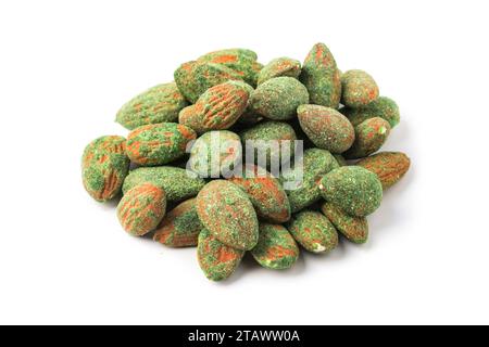 Handful of spicy almonds with wasabi isolated on white background Stock Photo