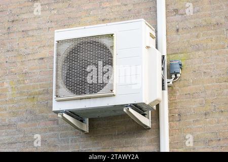 Air conditioning device on a wall Stock Photo