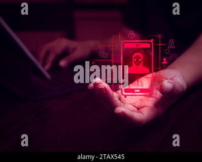 Mobile phone scam, scammer stealing data, digital identity thief, dark web, text sms fraud online concepts. Hacker symbol on smartphone with personal Stock Photo