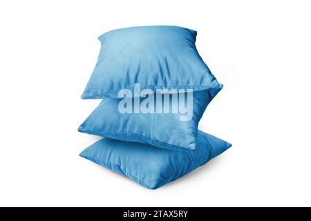Stack of blue pillows isolated on white background. Pile of  decorative cushions for sleeping and resting, home interior, house decor. Stock Photo