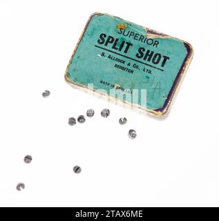 Lead split shot for weight on fishing line from the 1960s Stock Photo