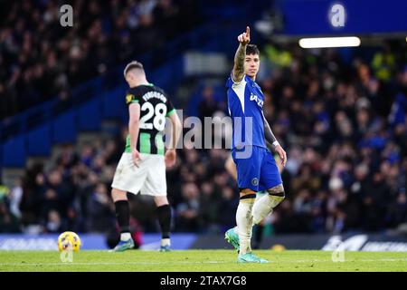 Chelsea's Enzo Fernandez (right) celebrates scoring their side's third goal of the game during the Premier League match at Stamford Bridge, London. Picture date: Sunday December 3, 2023. Stock Photo
