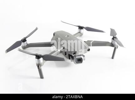 Aerial drone on white Background. Remote controled quadrocopter. Stock Photo