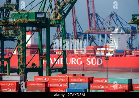 Santos city, Brazil. Port of Santos, Cranes at container terminal 37. Partial view of the Hamburg Sud cargo ship. Stock Photo